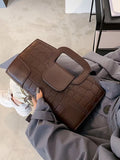 Clutchbag crocodile pattern