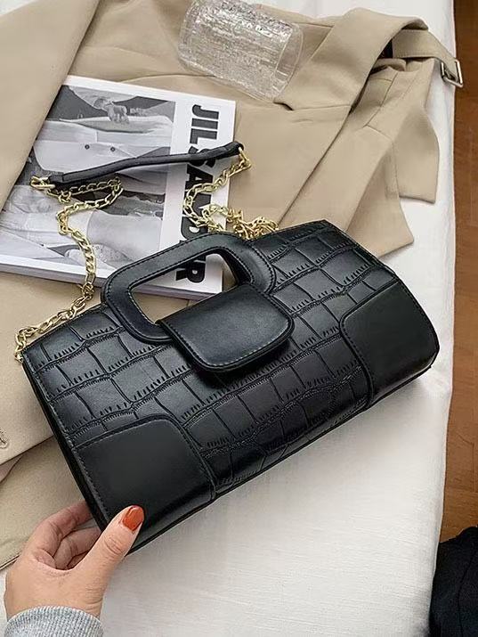 Clutchbag crocodile pattern